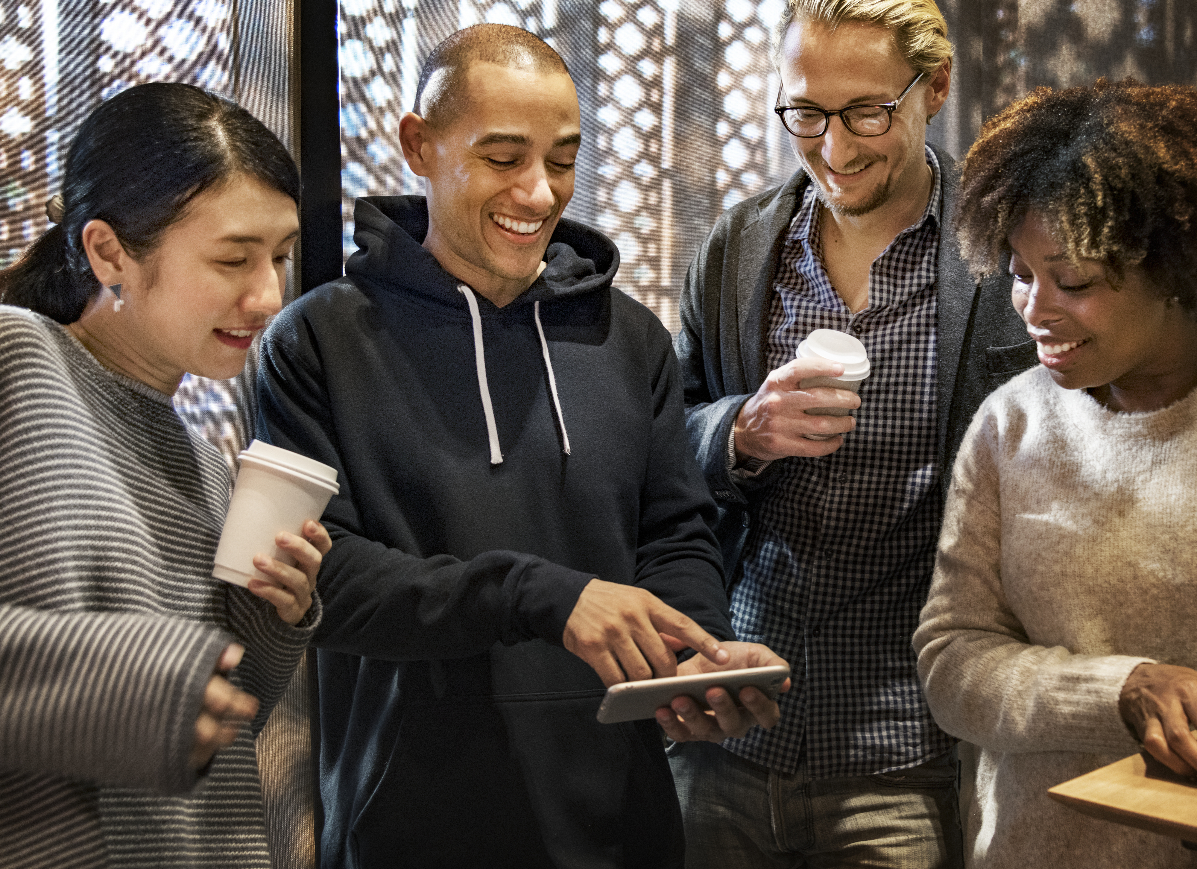 People looking at phones