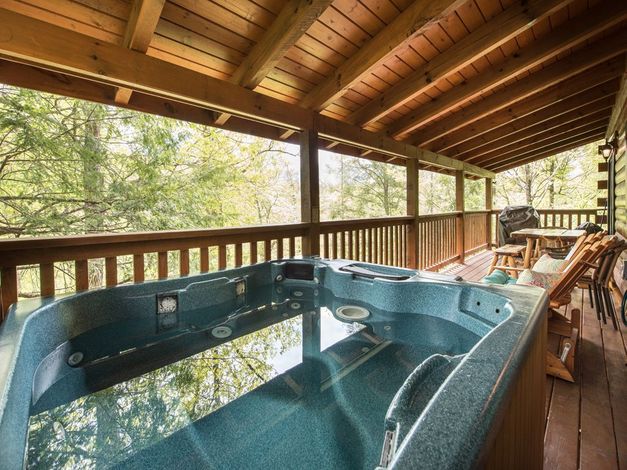 Hot Tub on the Porch of Bear Essentials Gatlinburg Cabin